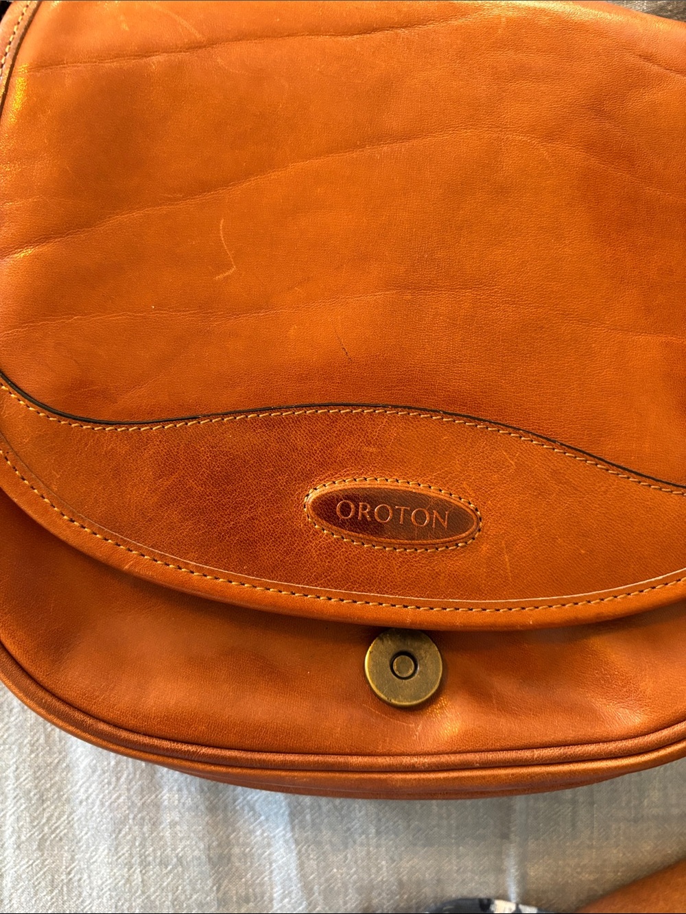 Oroton Cognac Leather crossbody Bag, zippered pocket on inside , dust bag